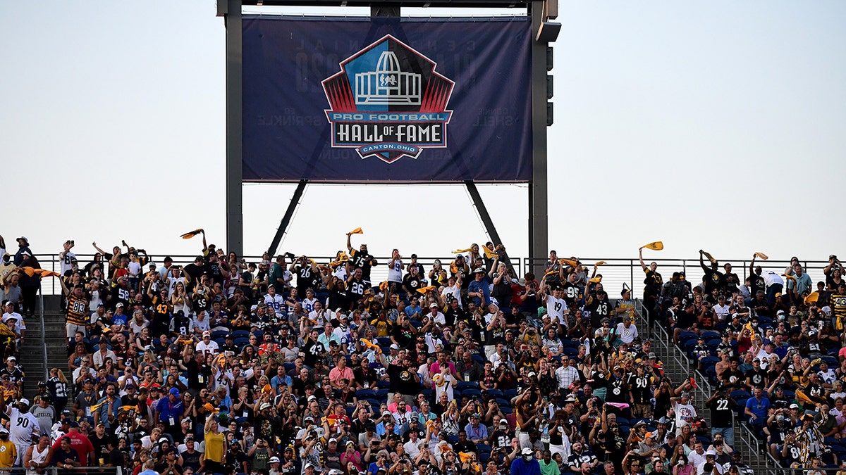 Fans cheer during the 2021 NFL preseason Hall of Fame Game between the Pittsburgh Steelers and Dallas Cowboys at Tom Benson Hall Of Fame Stadium on Aug. 5, 2021, in Canton, Ohio.