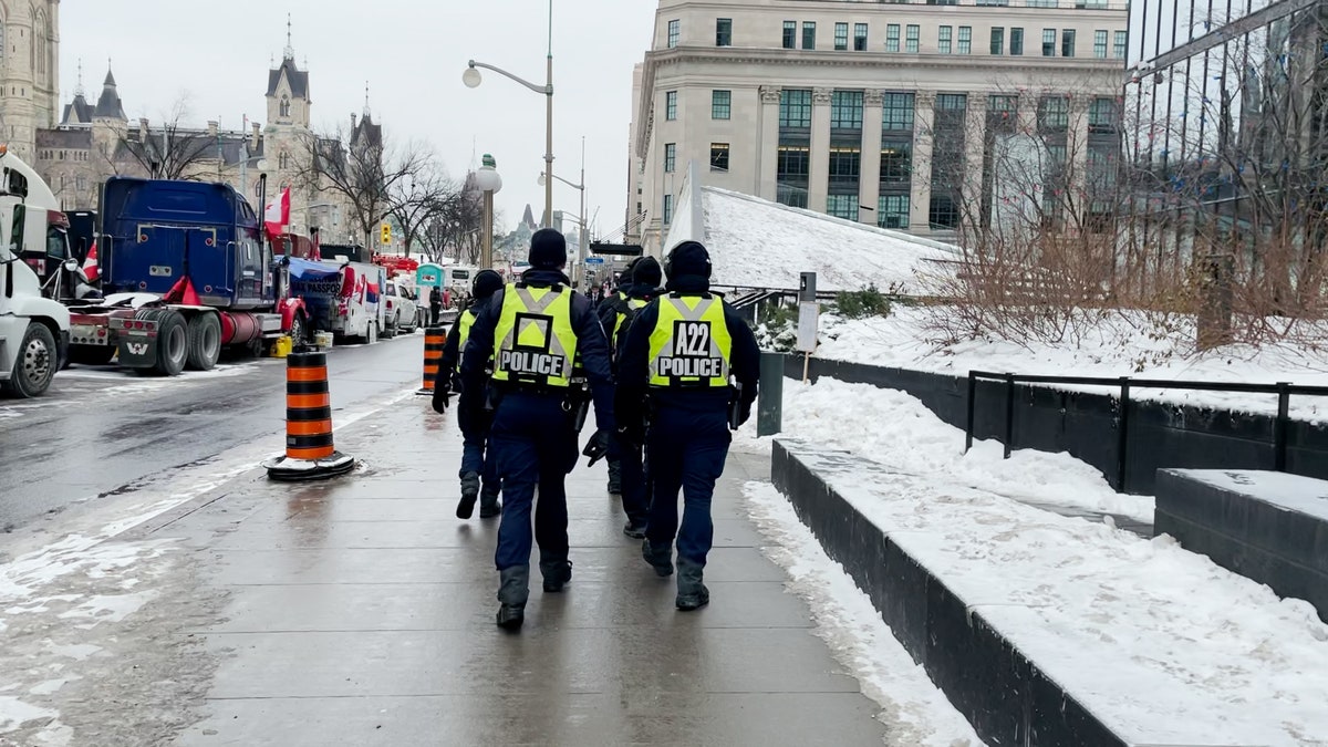 Police handed out notices to Freedom Convoy demonstrators who remained in Ottawa on Wednesday.