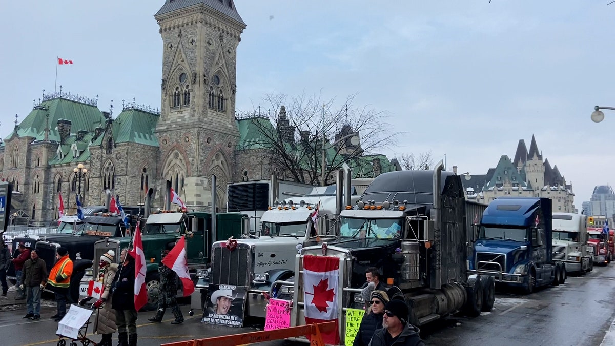 Trucks line the street in Ottawa, Canada at the "Freedom Convoy"