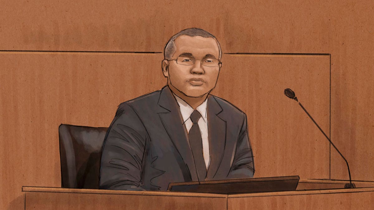 In this courtroom sketch, former Minneapolis Police Officer Tou Thao testifies during his trial in the killing of George Floyd in federal court in St. Paul, Minn., on Tuesday, Feb. 15, 2022.
