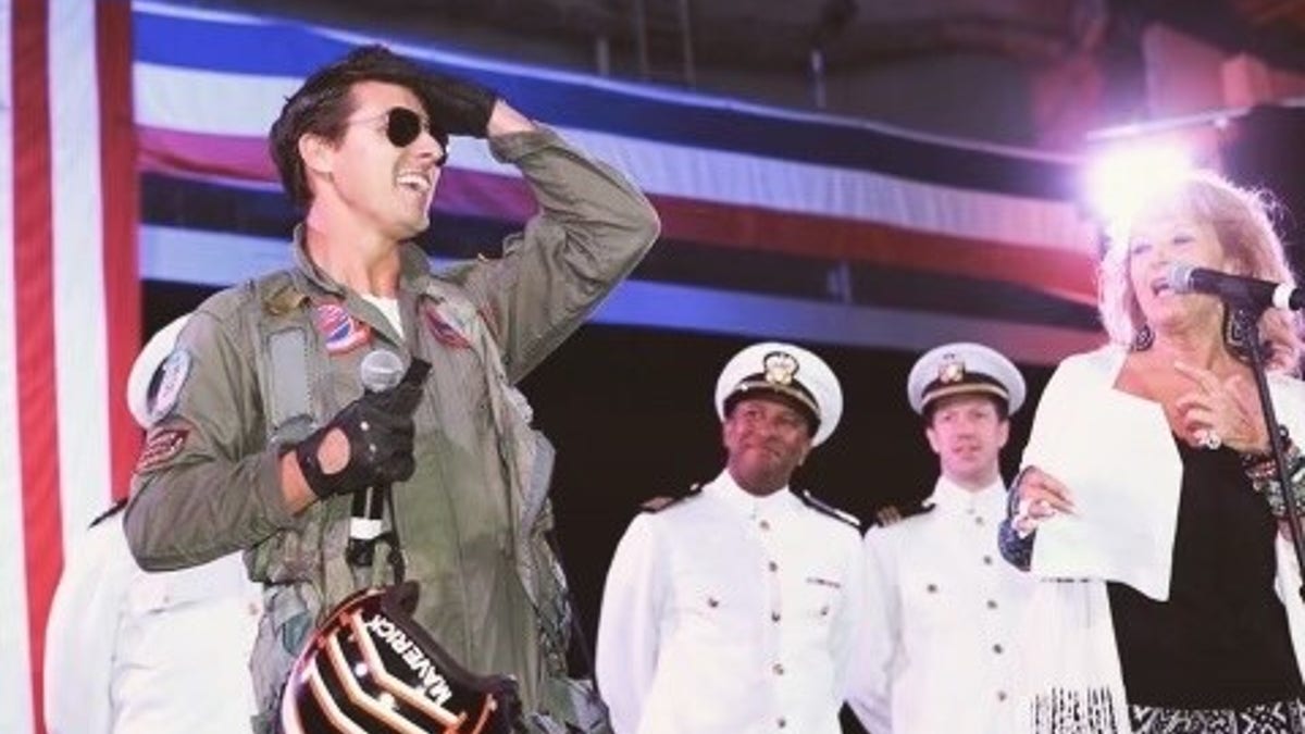 Jerome LeBlanc, left, impersonates Tom Cruise's "Top Gun" character, Lt. Pete 