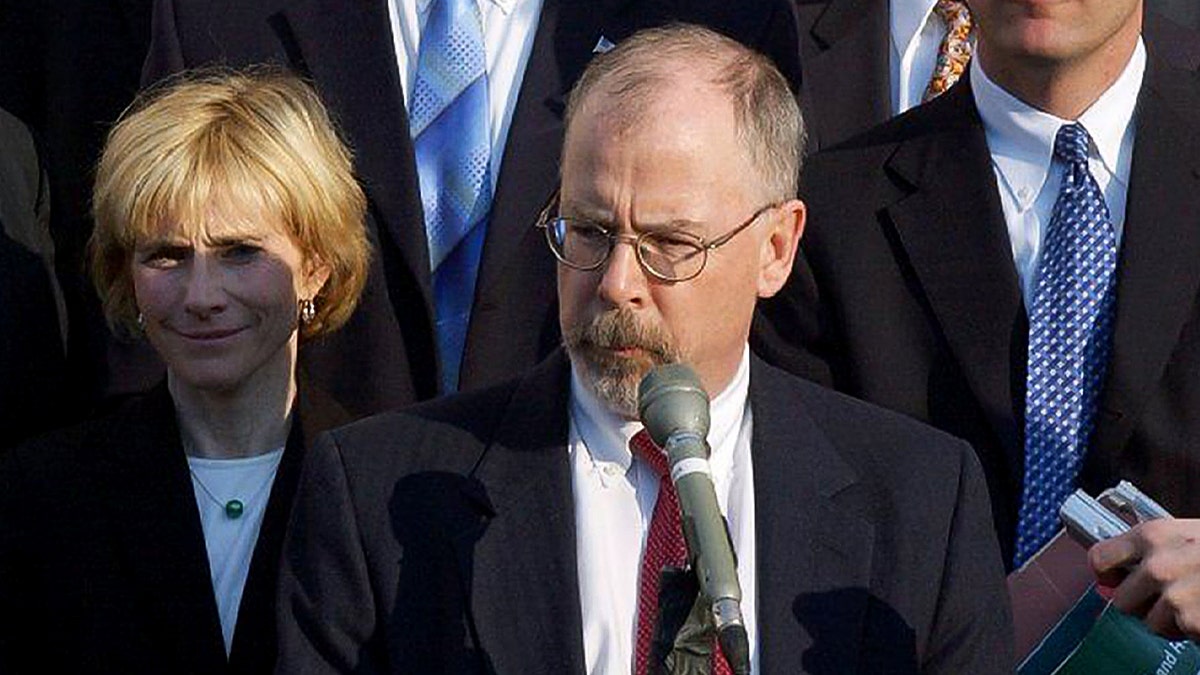 U.S. Attorney John Durham, center, outside federal court in New Haven, Conn., after the sentencing of former Gov. John Rowland. Durham will continue as special counsel in the investigation of the origins of the Trump-Russia inquiry, but is being asked to resign as U.S. attorney.