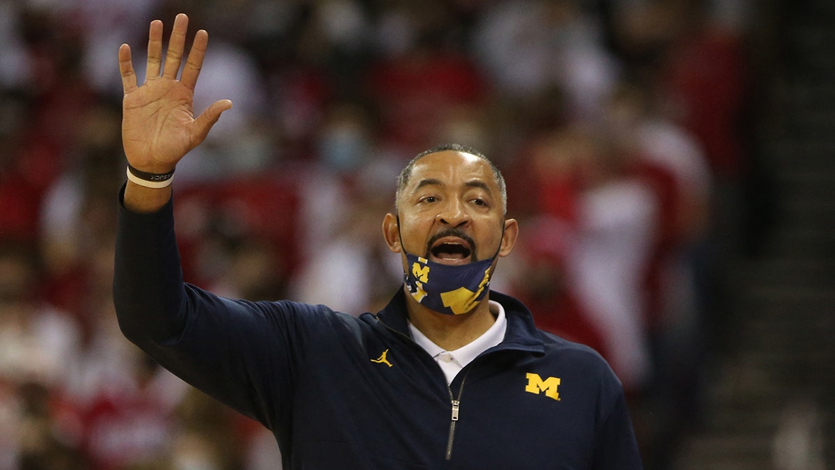 Michigan Wolverines head coach Juwan Howard directs his team during the game with the Wisconsin Badgers at the Kohl Center on Feb. 20, 2022, in Madison, Wisconsin. 