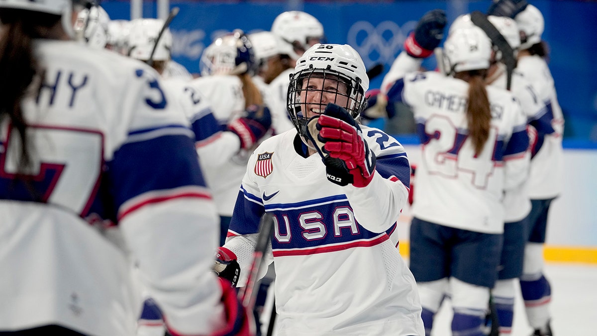 The United States' Kendall Coyne Schofield celebrates after a win against Finland in a preliminary round women's hockey game at the 2022 Winter Olympics, Thursday, Feb. 3, 2022, in Beijing.