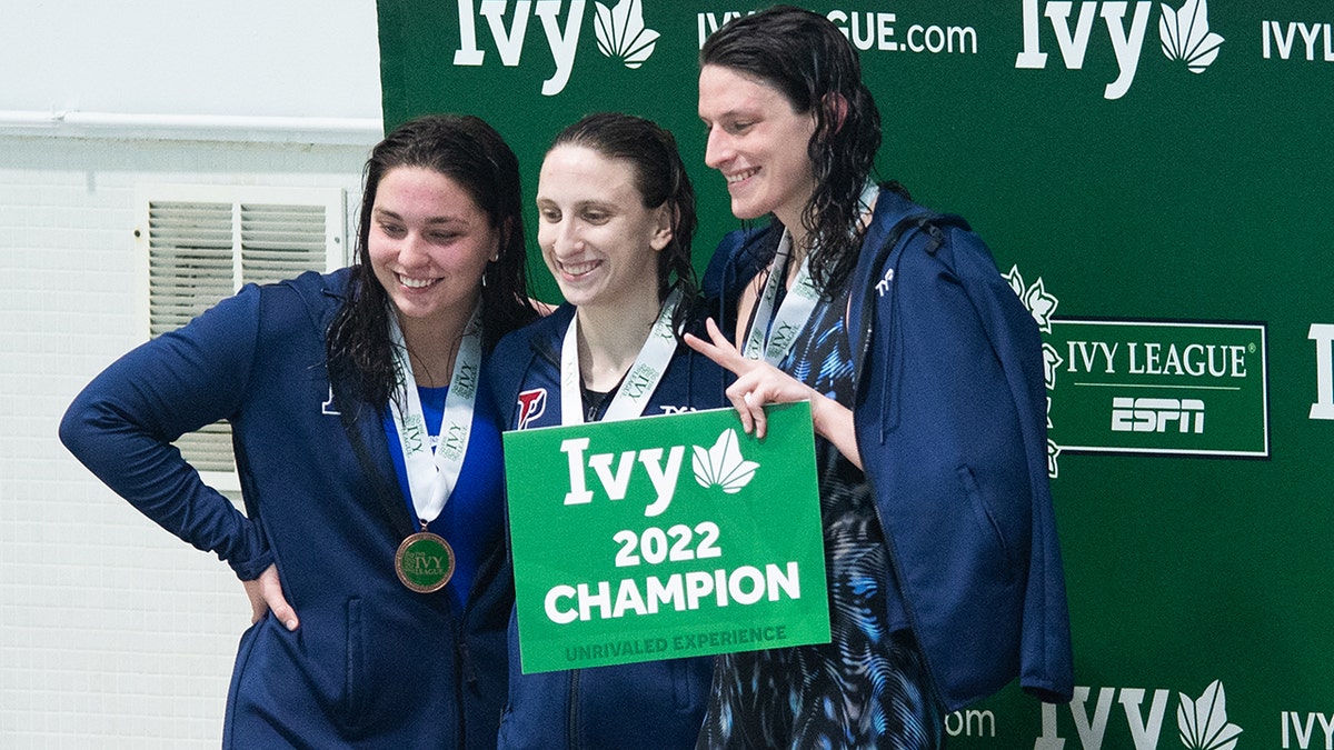 University of Pennsylvania swimmer Lia Thomas smiles on the podium after winning the 500 freestyle during the 2022 Ivy League Womens Swimming and Diving Championships at Blodgett Pool on February 17, 2022 in Cambridge, Massachusetts.