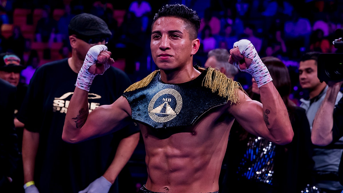 Mario Barrios poses after beating Juan Jose Velasco during the second round of their super welterweight fight at EagleBank Arena on May 11, 2019, in Fairfax, Virginia.