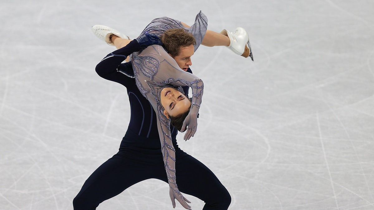 Madison Chock and Evan Bates of Team United States skate during the Ice Dance Free Dance Team Event on day three of the Beijing 2022 Winter Olympic Games. (Photo by Amin Mohammad Jamali/Getty Images)