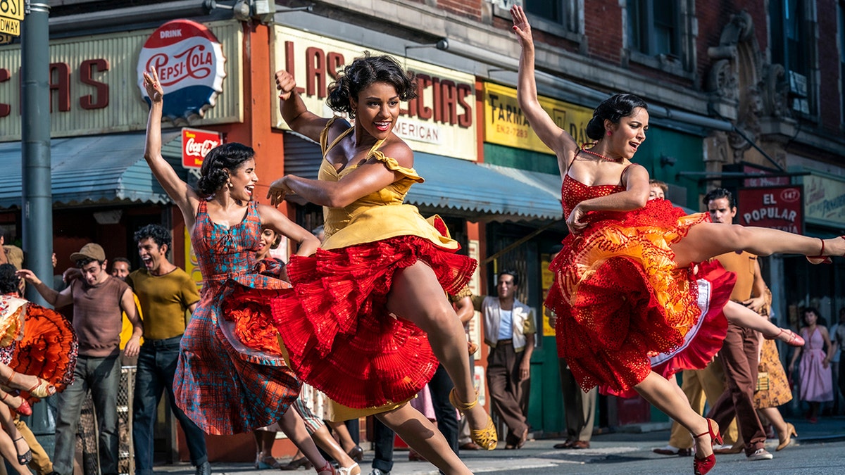 This image released by 20th Century Studios shows, from left, Ilda Mason as Luz, Ariana DeBose as Anita, and Ana Isabelle as Rosalia in "West Side Story."