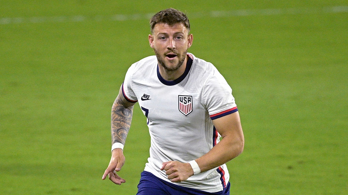 FILE  -United States forward Paul Arriola (7) follows a play during the first half of an international friendly soccer match against Trinidad and Tobago, Sunday, Jan. 31, 2021, in Orlando, Fla.