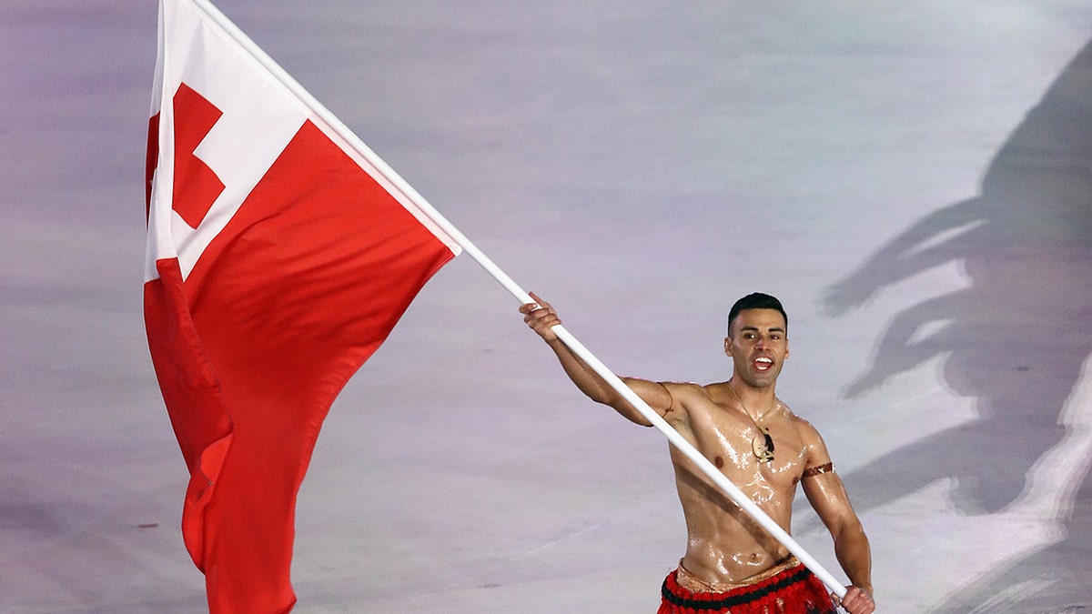 Flag-bearer Pita Taufatofua of Tonga leads the team during the Opening Ceremony of the PyeongChang 2018 Winter Olympic Games at PyeongChang Olympic Stadium on Feb. 9, 2018, in Pyeongchang-gun, South Korea.