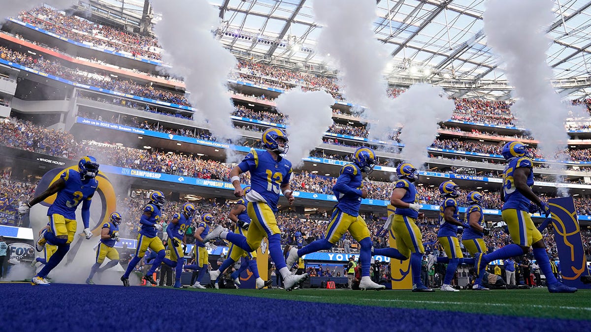 The Los Angeles Rams are introduced before the NFC Championship NFL football game against the San Francisco 49ers Sunday, Jan. 30, 2022, in Inglewood, California.