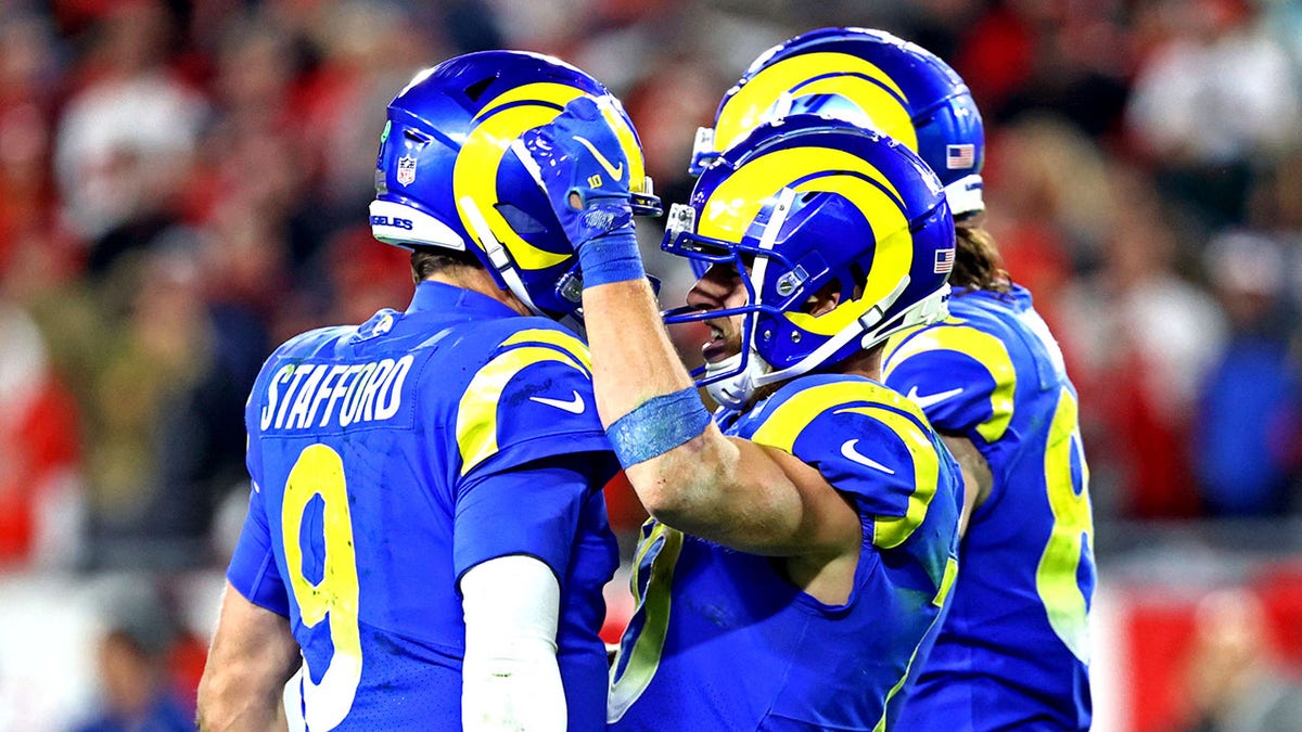 Los Angeles Rams quarterback Matthew Stafford (9) celebrates with wide receiver Cooper Kupp after a play during the second half against the Tampa Bay Buccaneers in am NFC Divisional playoff football game at Raymond James Stadium, Jan. 23, 2022, in Tampa, Florida. 