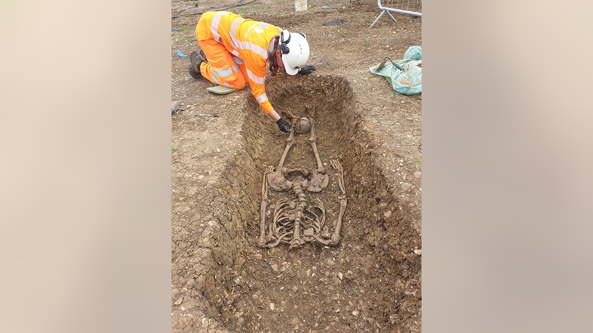 Roman skeleton with head placed between legs uncovered during archaeological excavations at Fleet Marston, near Aylesbury, Buckinghamshire. Excavations took place during 2021.