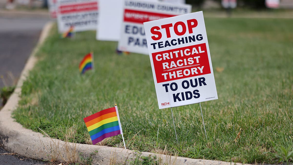 Critical race theory sign on lawn in loudoun county