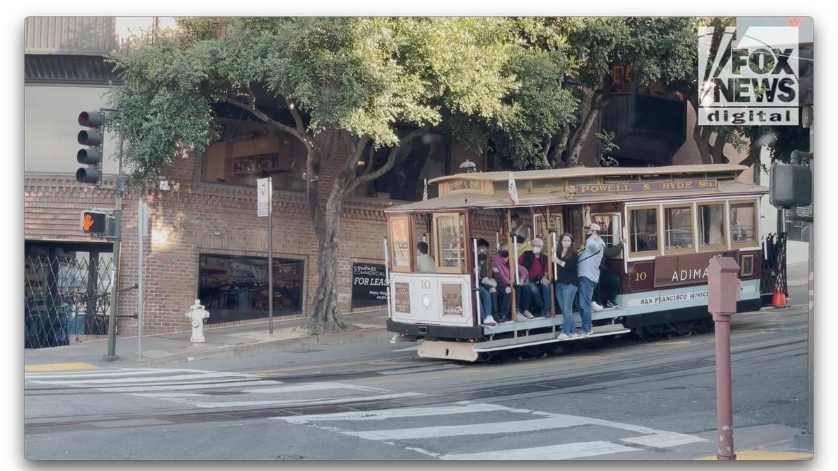 Riders wear masks while aboard the Powell/Hyde cable car (Fox News Digital/Jon Michael Raasch)