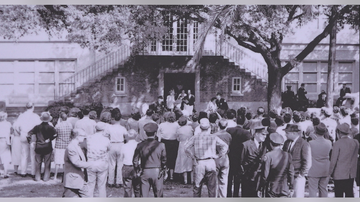 The girls faced a hateful crowd of parents who wanted to keep Black students out of White schools. Courtesy: TEP Center