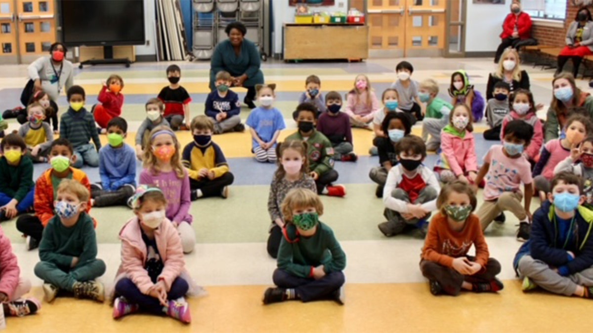 Georgia Democratic gubernatorial candidate Stacey Abrams spoke without a mask to masked students at Glennwood Elementary School in Decatur, Georgia, Friday, Feb. 4, 2022.