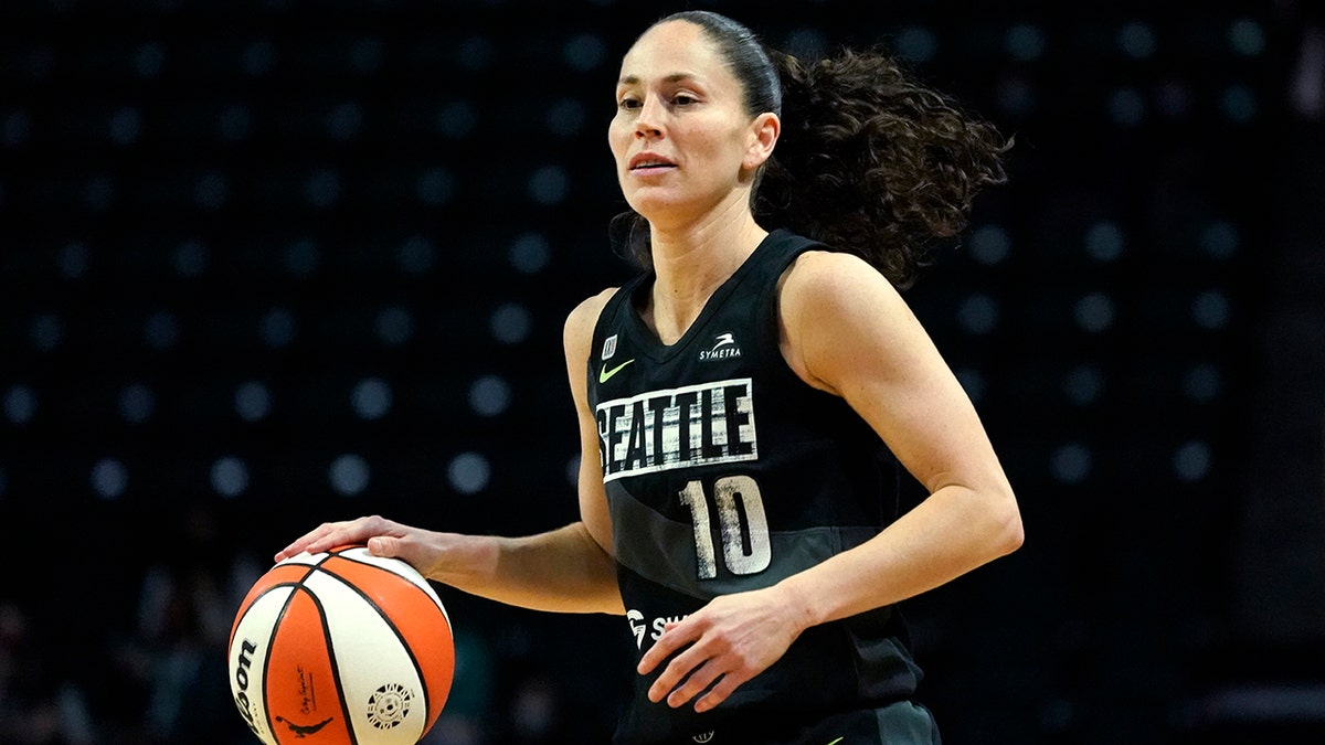 FILE - Seattle Storm's Sue Bird dribbles in the first half of a WNBA second round playoff basketball game against the Phoenix Mercury,  Sunday, Sept. 26, 2021, in Everett, Wash. Sue Bird officially re-signed Friday, Feb. 18, 2022, with the Seattle Storm, her only WNBA team, in what is expected to be her final season.