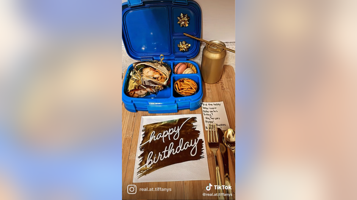 Golden birthday lunch box prepared by Tiffany Keene includes shrimp and lobster wrap, cheese crisps and macrons