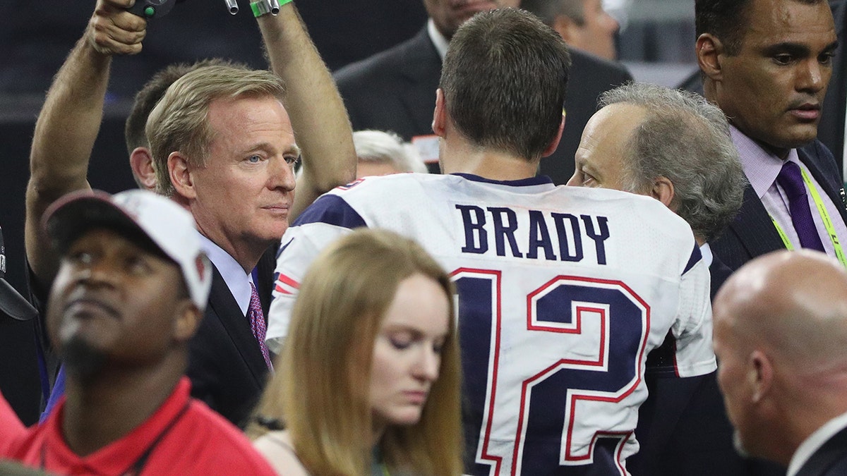 NFL commissioner Roger Goodell speaks to Tom Brady of the New England Patriots after the Patriots defeated the Atlanta Falcons during Super Bowl 51 at NRG Stadium on Feb. 5, 2017, in Houston, Texas. 