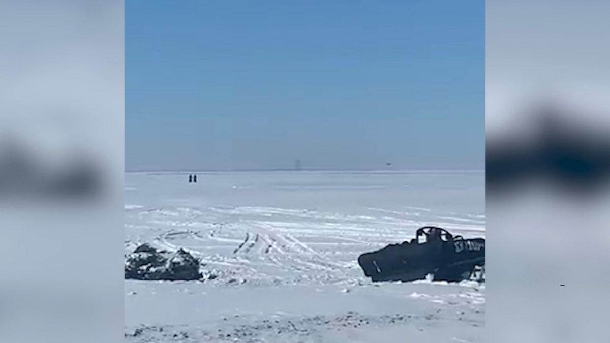 Lake Erie ice rescue snowboaders Coast Guard