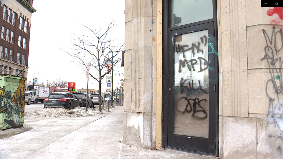 Vandalism is seen in Minneapolis after rioters protested in the city on Friday.