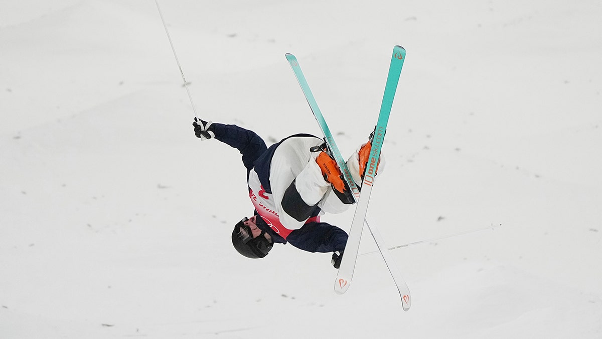 Sweden's Walter Wallberg competes in the men's moguls finals at Genting Snow Park at the 2022 Winter Olympics, Saturday, Feb. 5, 2022, in Zhangjiakou, China.