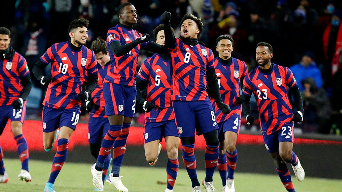 United States' Weston McKennie (8) celebrates a goal with teammates Kellyn Acosta (23), Reggie Cannon (4), Antonee Robinson (5), Tim Weah, (21) and Ricardo Pepi (18) during the first half of the team's FIFA World Cup qualifying soccer match against Honduras, Wednesday, Feb. 2, 2022, in St. Paul, Minn. 