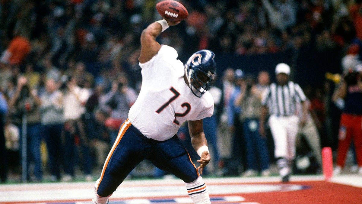  William Perry #72 celebrates after scoring a touchdown against the New England Patriots during Super Bowl XX at the Louisiana Superdome Jan. 26, 1986, in New Orleans, Louisiana. 