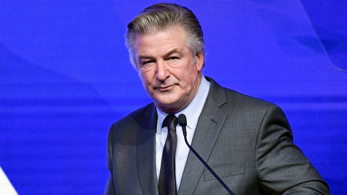 Alec Baldwin in a suit at a gala