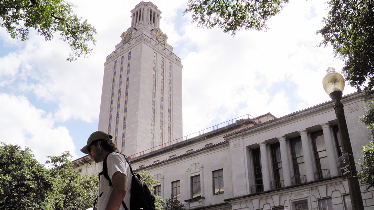 A student walks at the University of Texas campus in Austin, Texas, June 23, 2016.