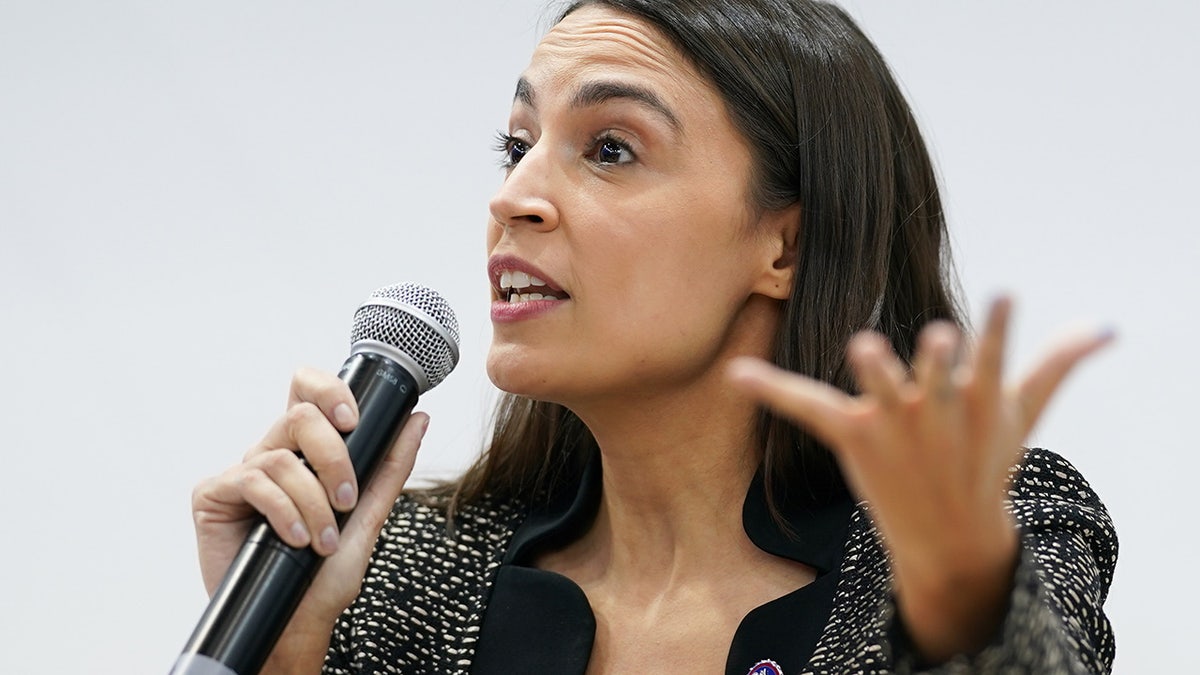 Alexandria Ocasio-Cortez, U.S. representative for New York's 14th Congressional District, speaks during an event at the U.S. Climate Action Center during COP26 on Nov. 9, 2021, in Glasgow. 