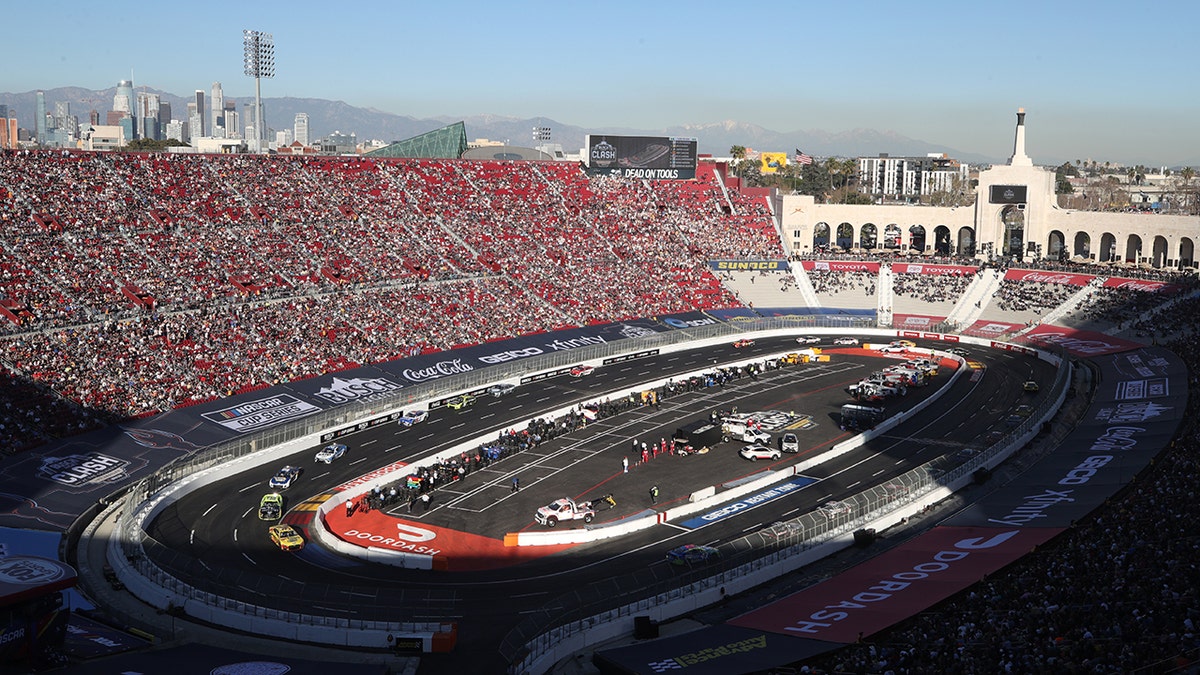 LOS ANGELES, CALIFORNIA - FEBRUARY 06: Drivers race during the NASCAR Cup Series Busch Light Clash at the Los Angeles Memorial Coliseum on February 06, 2022 in Los Angeles, California. (Photo by Meg Oliphant/Getty Images)