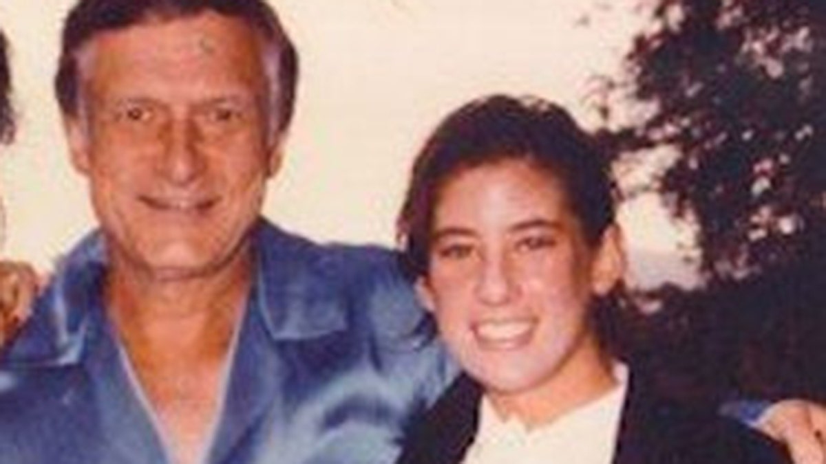 Hugh Hefner and a young Jennifer Saginor.