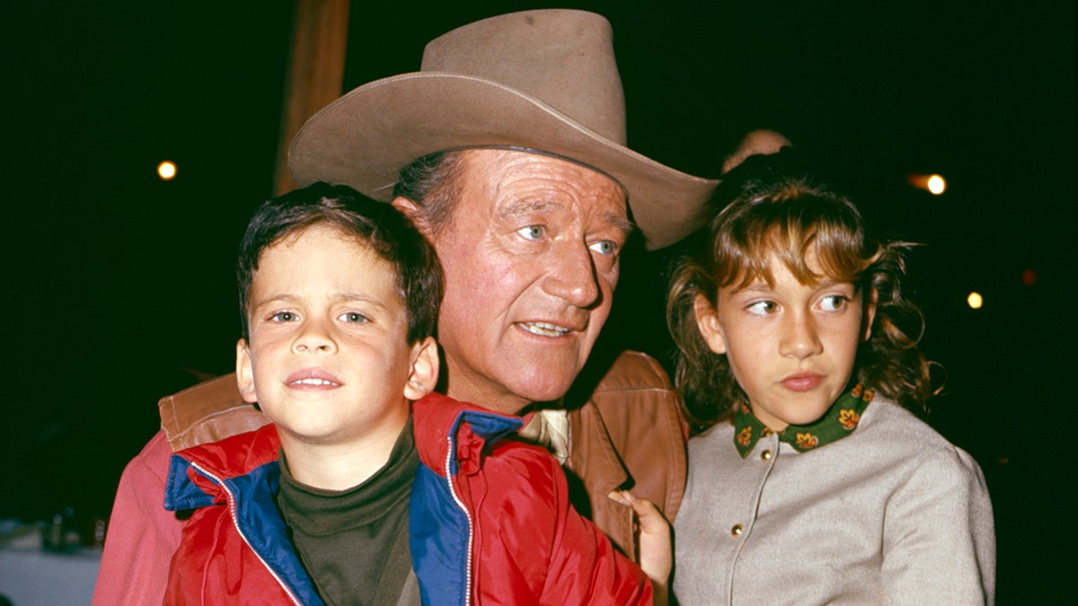John Wayne with children