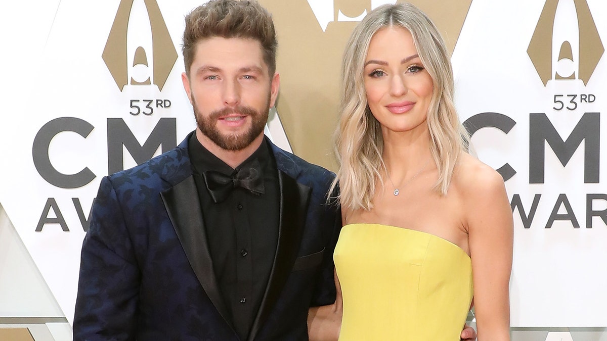 Chris Lane and Lauren Bushnell attend the 53nd annual CMA Awards at Bridgestone Arena on November 13, 2019 in Nashville, Tennessee.