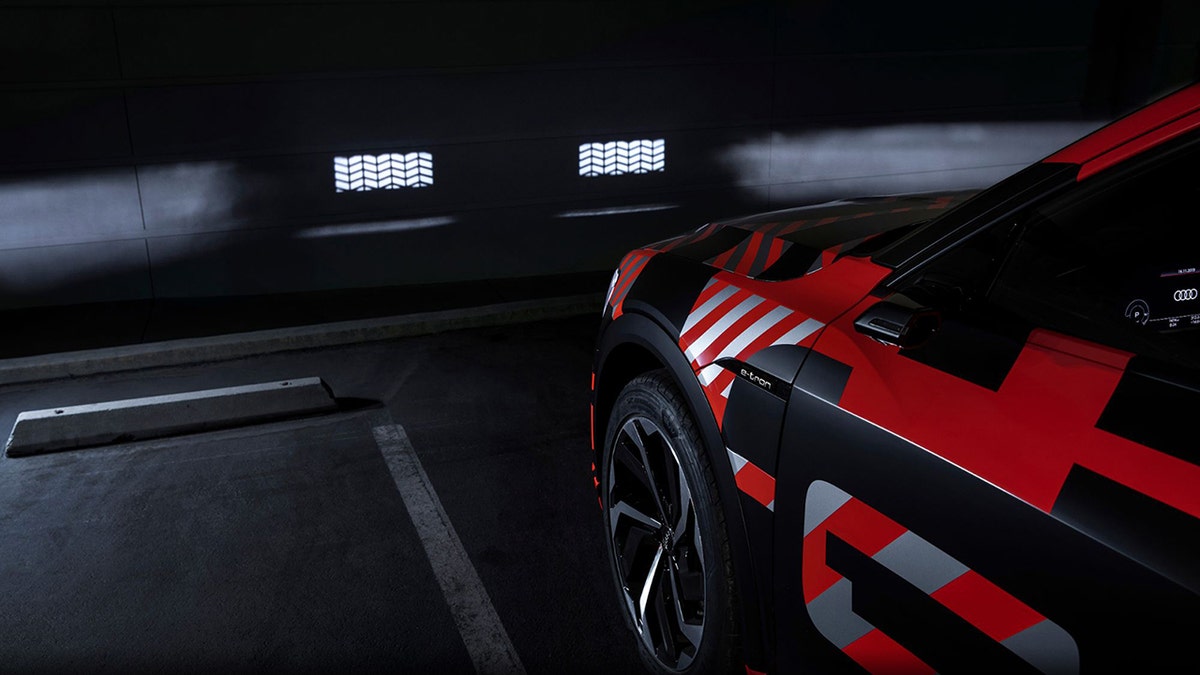 Audi's lighting tech can be focused enough to project images on a wall.