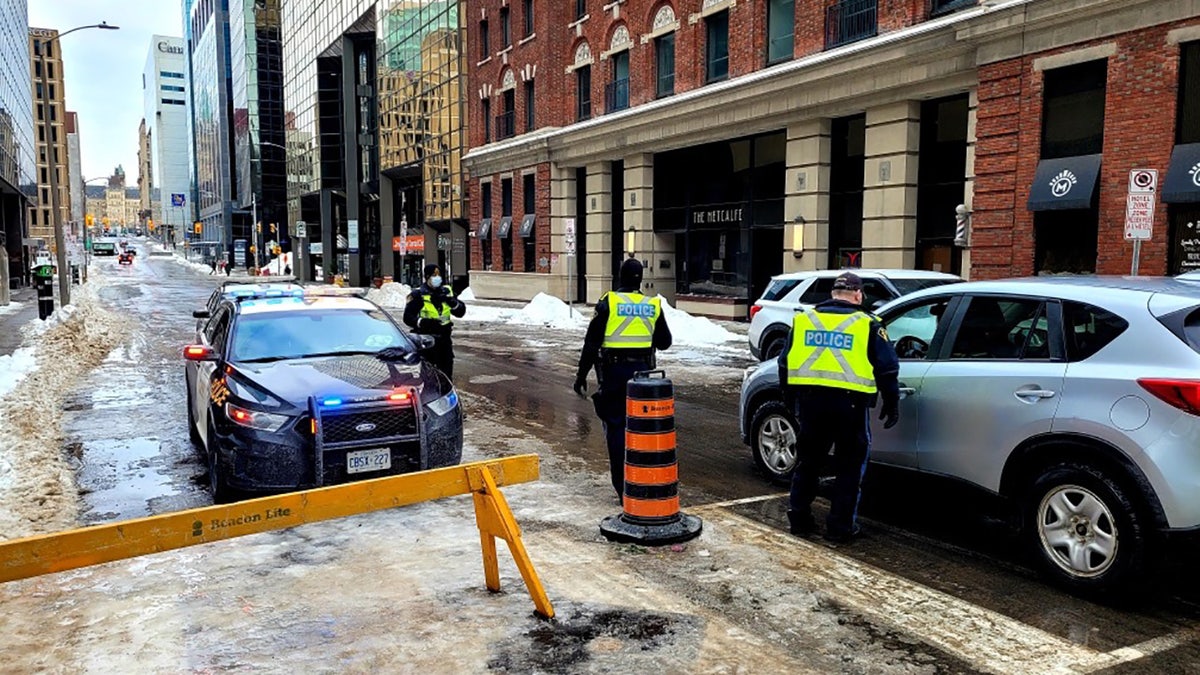 Ottawa police began securing the city’s downtown over the weekend as the three-week standoff reached a boiling point between law enforcement and demonstrators.