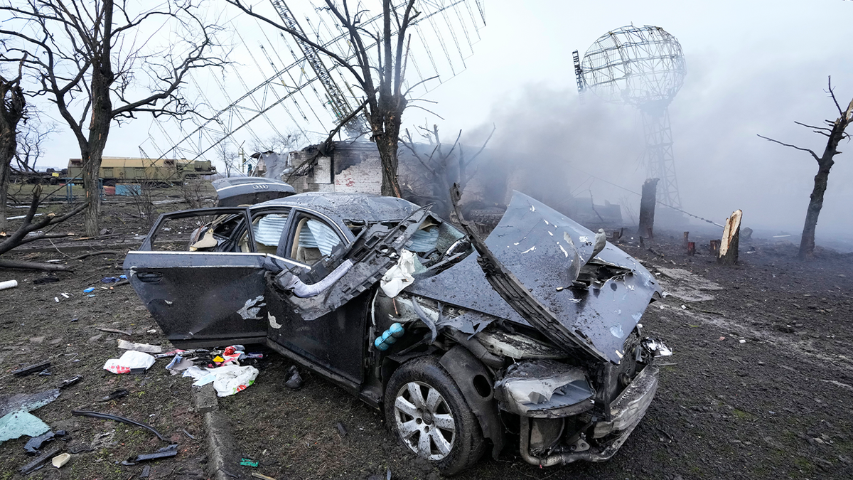 Damaged radar, a vehicle and equipment are seen at a Ukrainian military facility outside Mariupol, Ukraine, Thursday, Feb. 24, 2022.