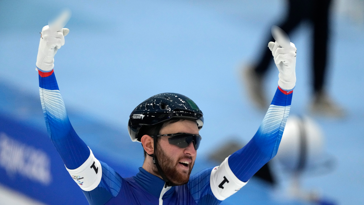 Daniil Aldoshkin of Team Russian Olympic Committee reacts after their heat in the speedskating men's team pursuit semifinals at the 2022 Winter Olympics, Tuesday, Feb. 15, 2022, in Beijing. 