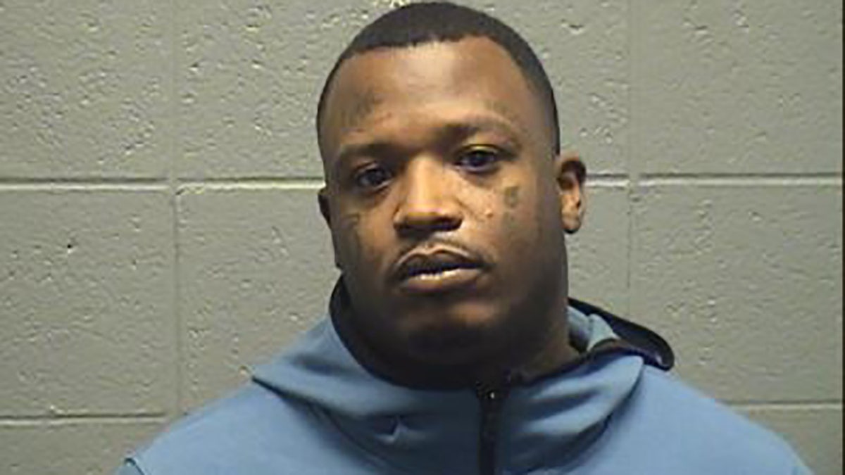 A Chicago man arrested with just $5 in his pocket is accused of leading a crew in a spree of high-end smash-and-grabs, stealing an estimated $175,000 in merchandise and dumping cash registers on the street where Gov. J.B. Pritzker lives, authorities said Tuesday.