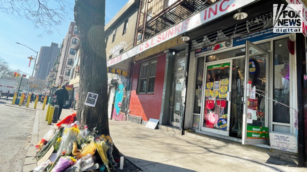 Christina Yuna Lee's apartment at 111 Chrystie Street with a makeshift memorial outside.