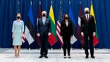 From left, Estonia's Prime Minister Kaja Kallas, Latvian President Egils Levits, Vice President Kamala Harris, and Lithuanian President Gitanas Nauseda, pose for photographs during the Munich Security Conference in Munich, Friday, Feb. 18, 2022. (AP Photo/Andrew Harnik, Pool)
