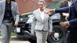 Chicago Police Officer Marni Washington, left, walks with then-Mayor-elect Lori Lightfoot on Sunday, May 19, 2019 at Resurrected Life Church International in the Hermosa neighborhood of Chicago. (Brian Cassella/Chicago Tribune/Tribune News Service via Getty Images)