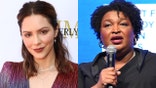 Stacey Abrams responded to critics like Katharine McPhee who bashed her for not wearing a mask in a photo with kids who are.