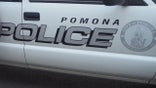 A police officer in Pomona was shot Thursday night and rushed to a nearby hospital.