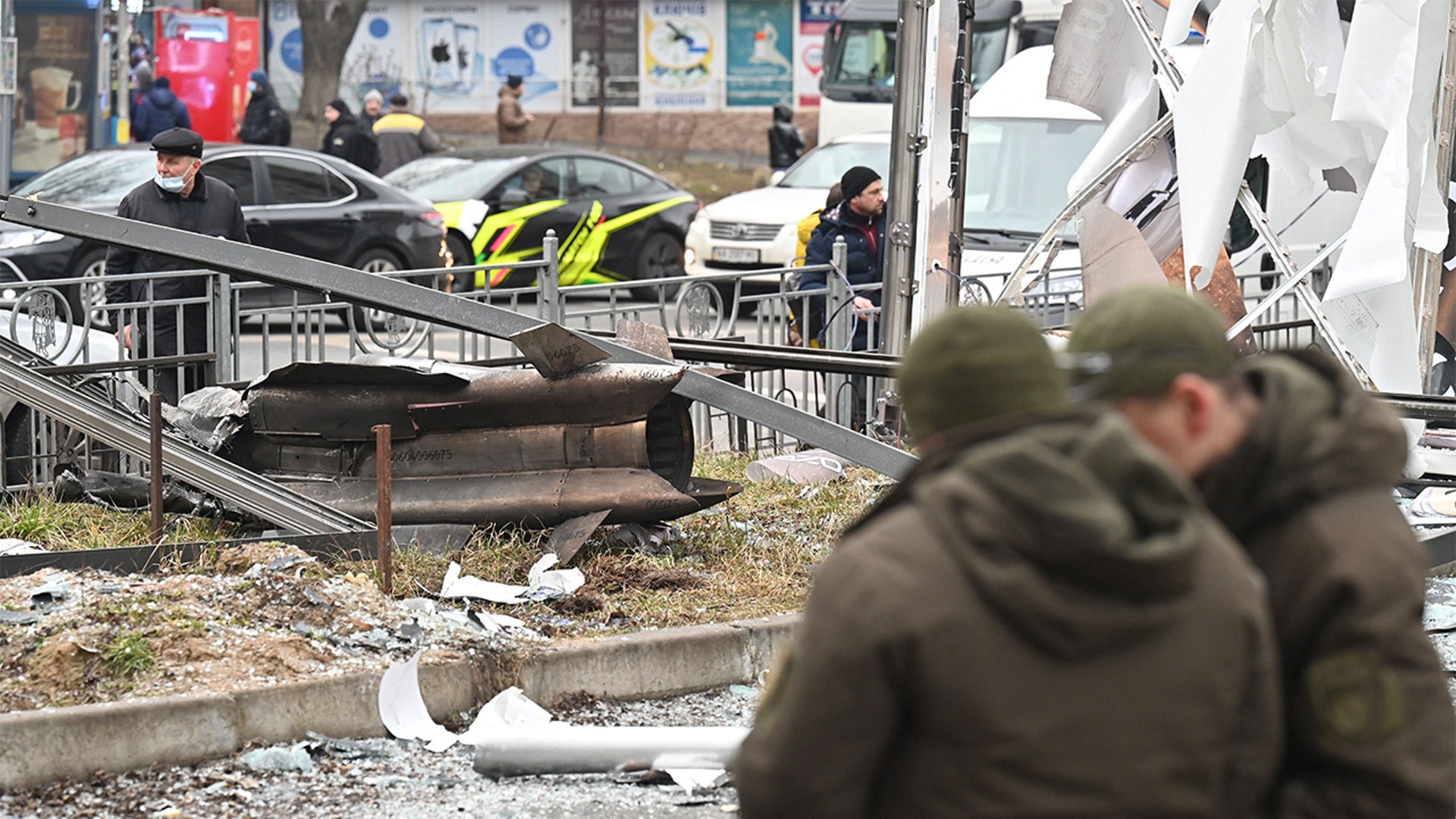 The remains of a shell is seen on a street in Kyiv on February 24, 2022.