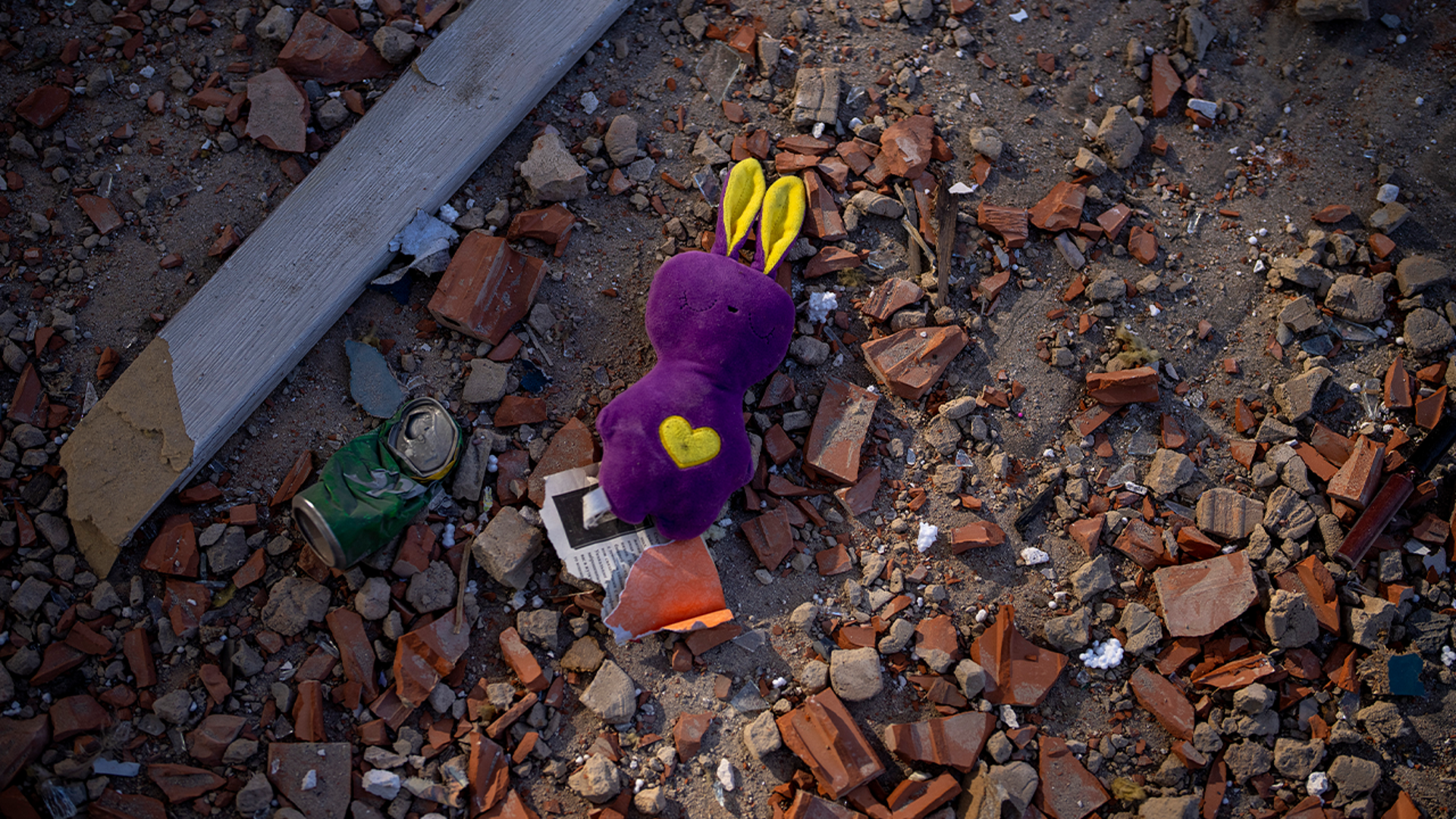A toy amongst the debris near an apartment building damaged following a rocket attack, in Kyiv, Ukraine, Saturday, Feb. 26, 2022. Russian troops stormed toward Ukraine's capital Saturday, and street fighting broke out as city officials urged residents to take shelter.