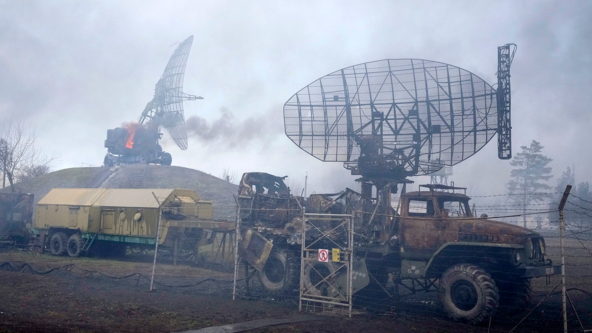 Damaged radar arrays and other equipment is seen at Ukrainian military facility outside Mariupol, Ukraine, Thursday, Feb. 24, 2022. Russia has launched a barrage of air and missile strikes on Ukraine early Thursday and Ukrainian officials said that Russian troops have rolled into the country from the north, east and south. (AP Photo/Sergei Grits)