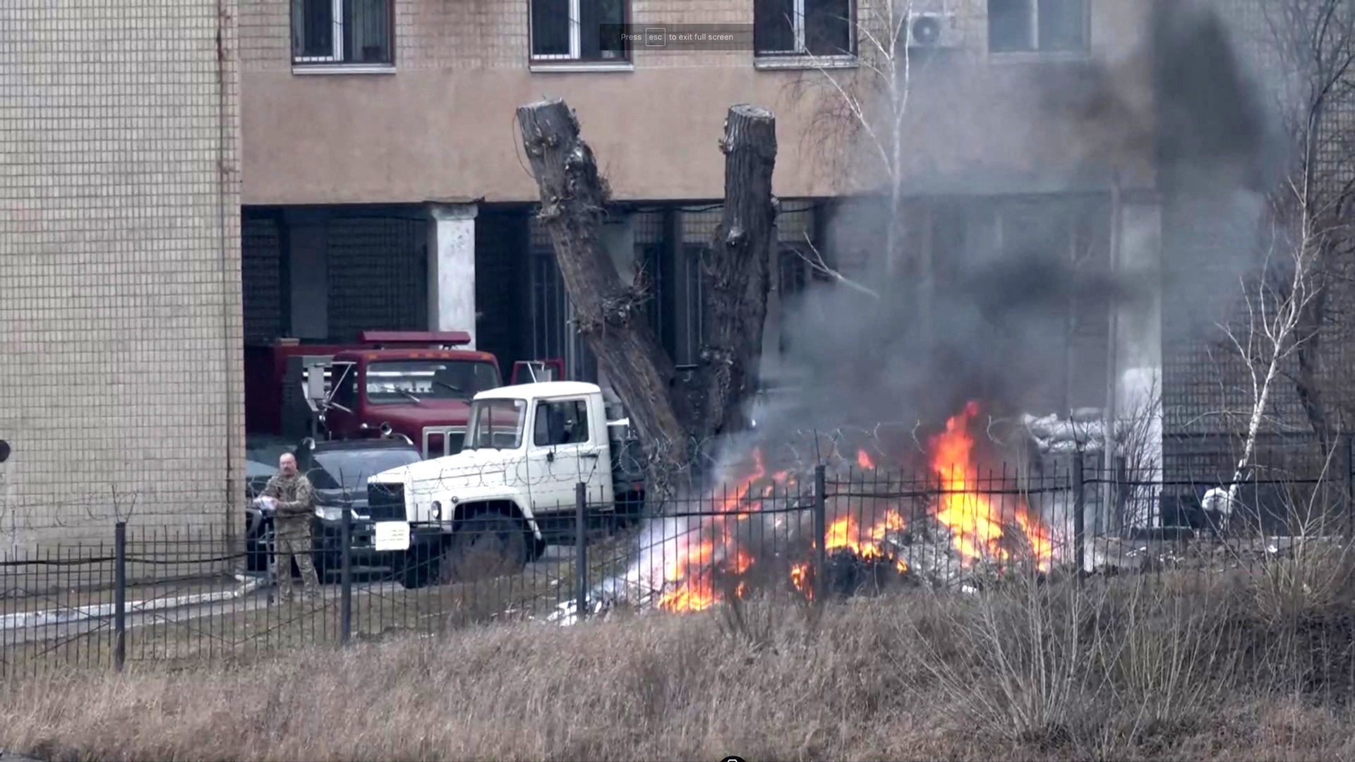 Smoke rises as a fire burns on the premises of the Ukrainian Defence Ministry's unit, in Kyiv, Ukraine February 24, 2022 in this screen grab taken from a live video. REUTERS TV/via REUTERS